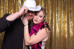 A cute couple in the photo booth